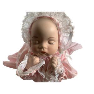 Dynasty Doll Collection Musical Baby Dara Doll porcelain.